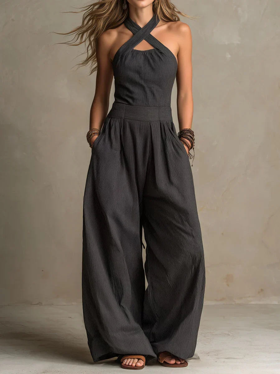 Women's halter jumpsuit in black with crossover neck and wide leg pants