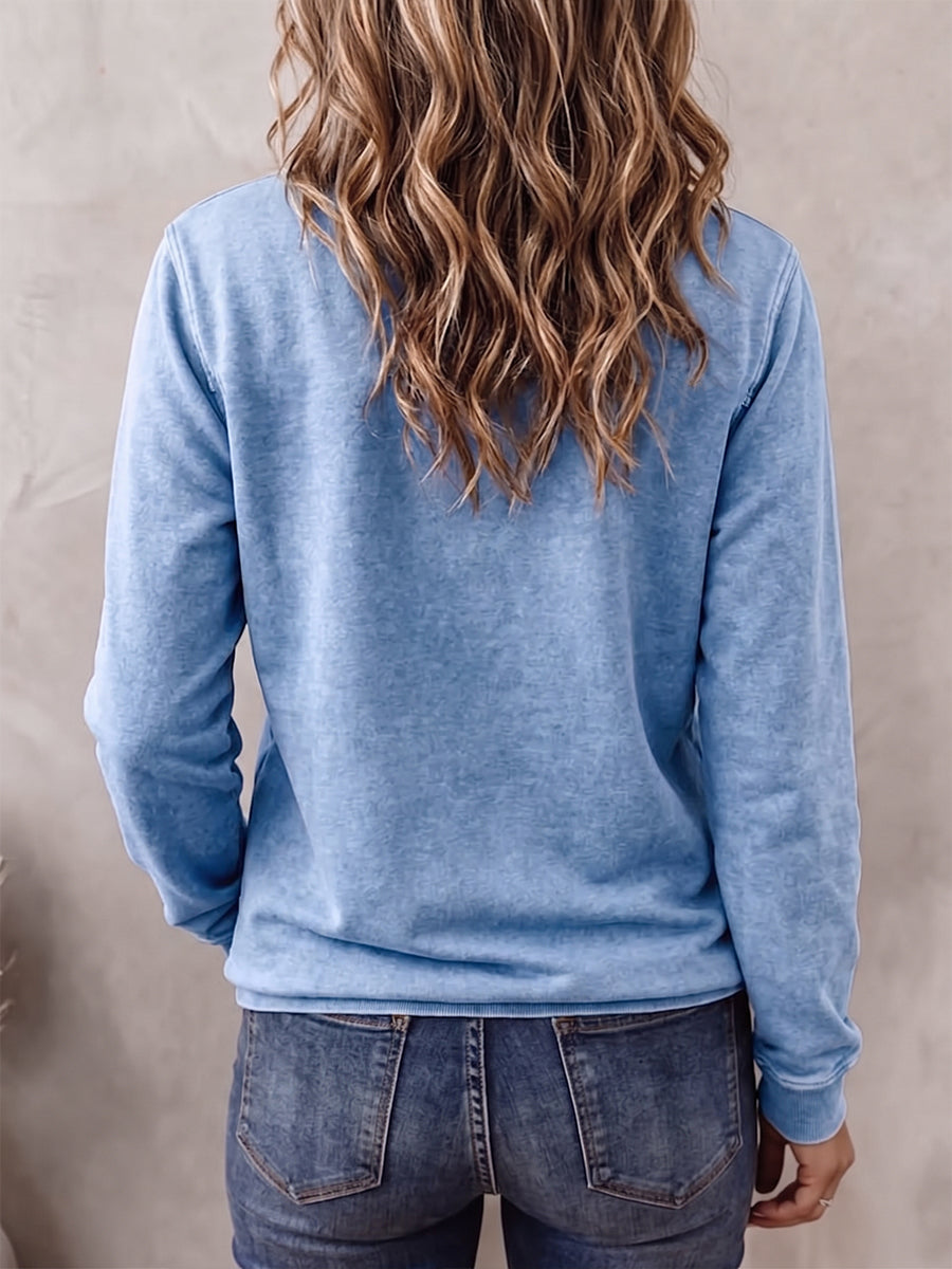 Back of the light blue henley sweatshirt