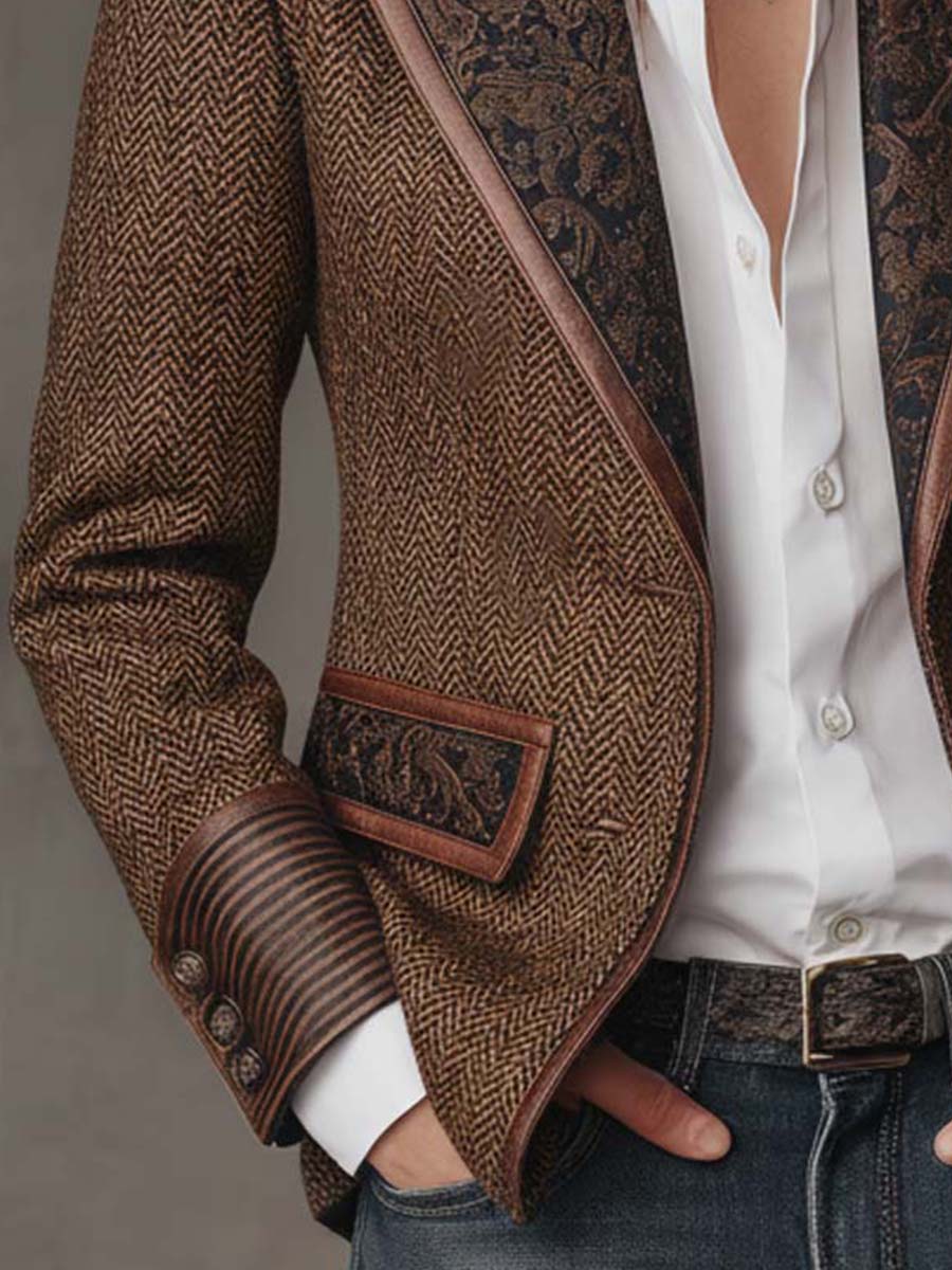 Close-up of the blazer cuff with leather trim and gold buttons