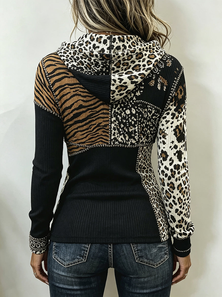 Back view of the patchwork hoodie with leopard hood and tiger print panel