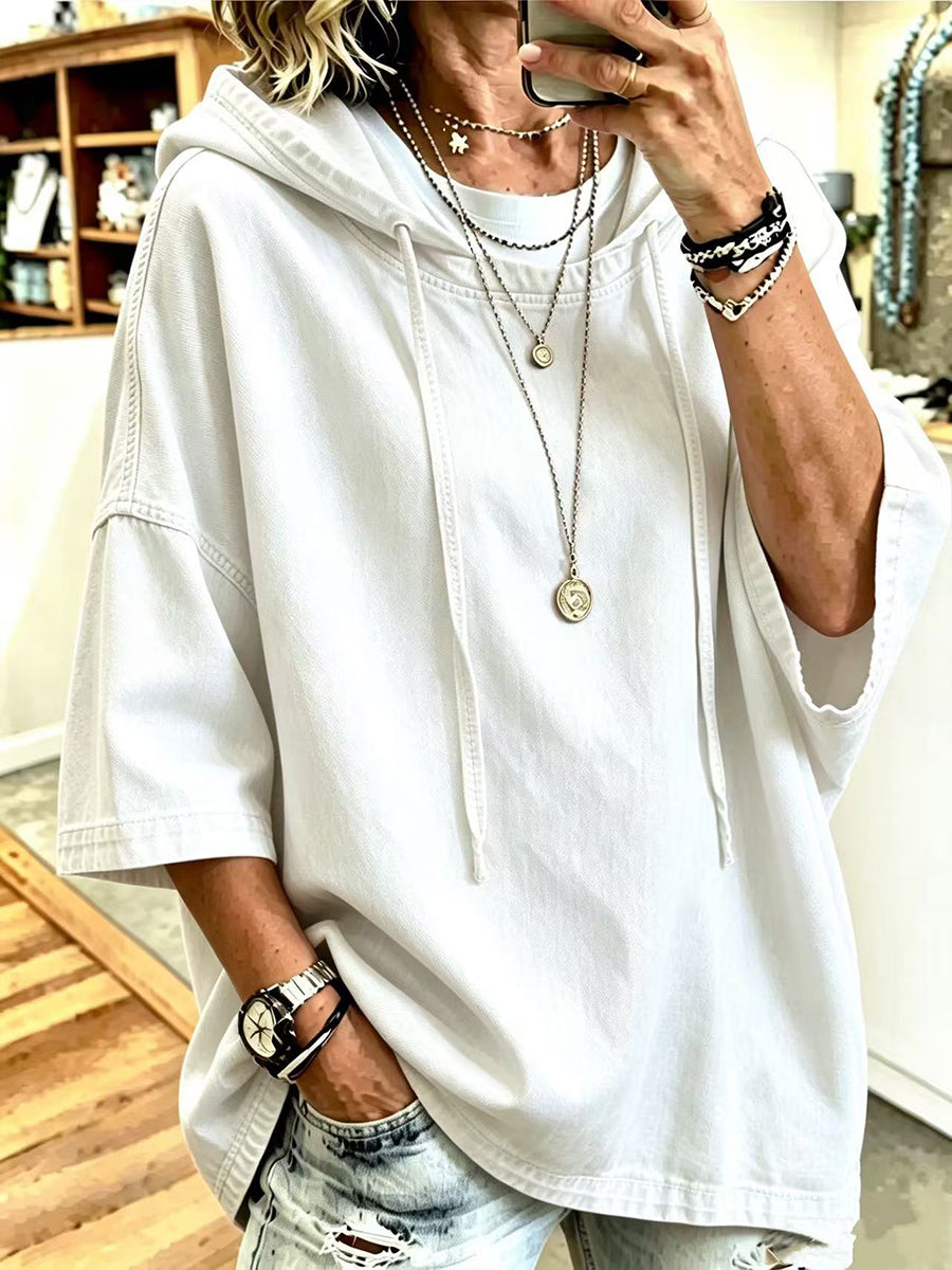 White short sleeve hoodie with drawstring hood and dropped shoulders