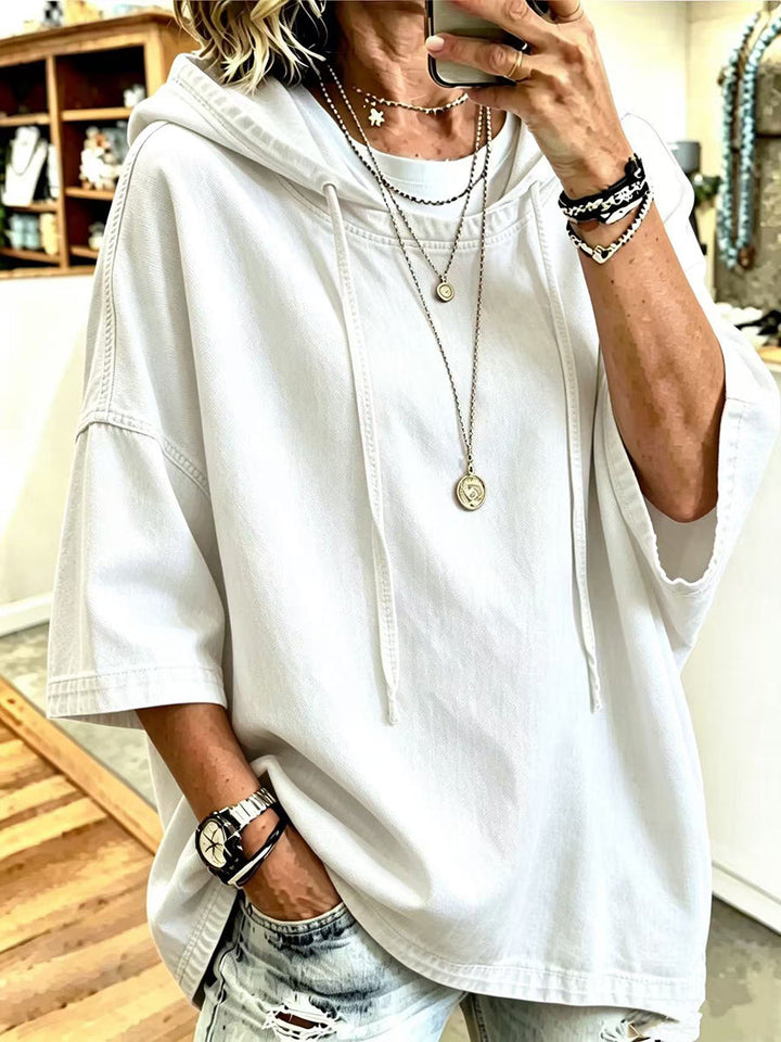 White short sleeve hoodie with drawstring hood and dropped shoulders