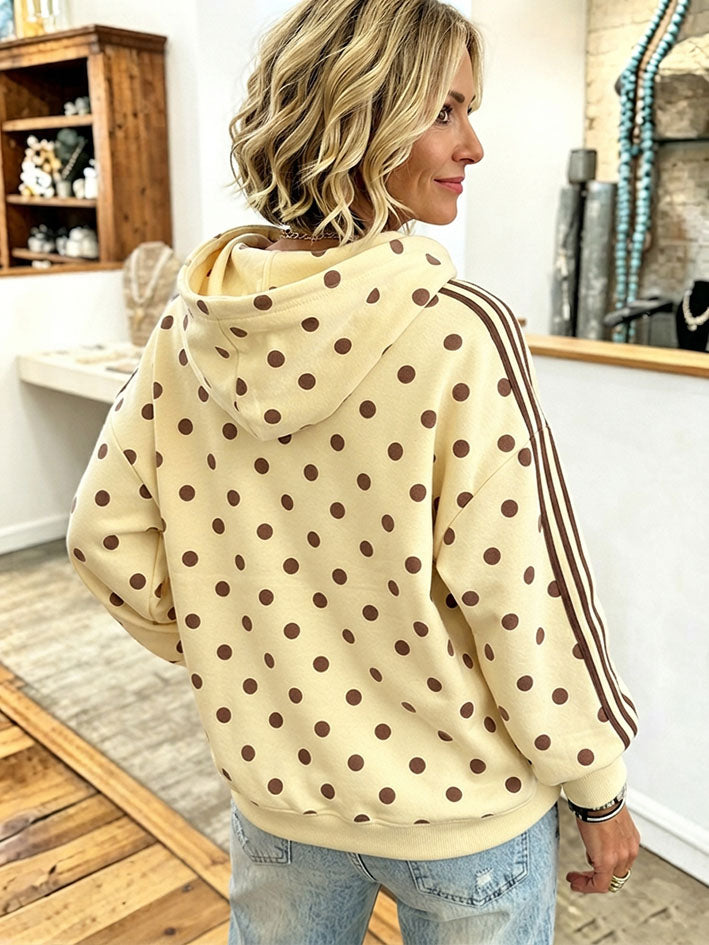 Back view of the yellow polka dot hoodie with hood and sleeve stripes