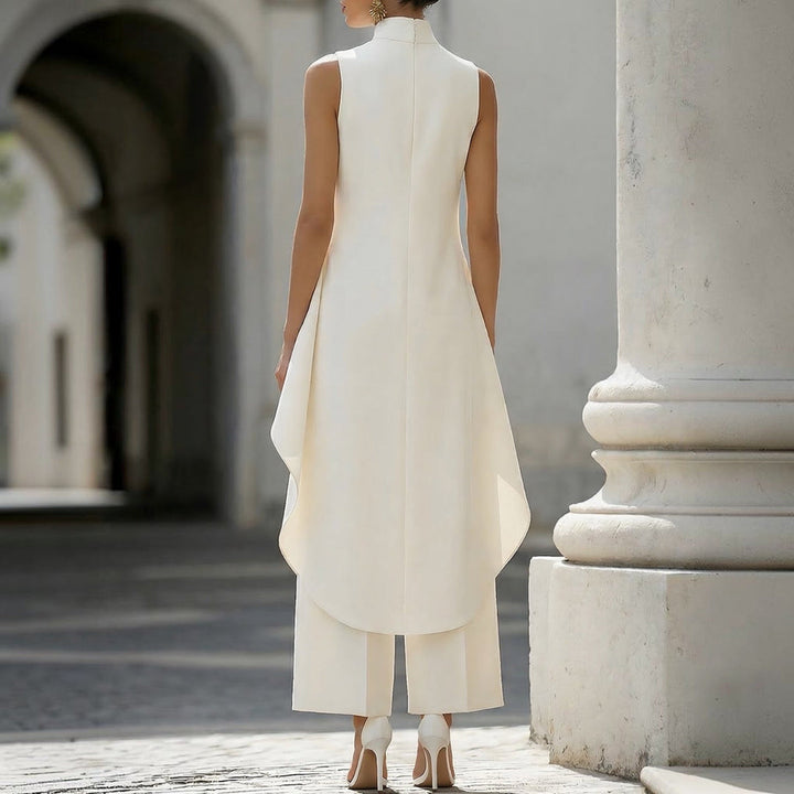 Back view of the ivory sleeveless jumpsuit with draped layer