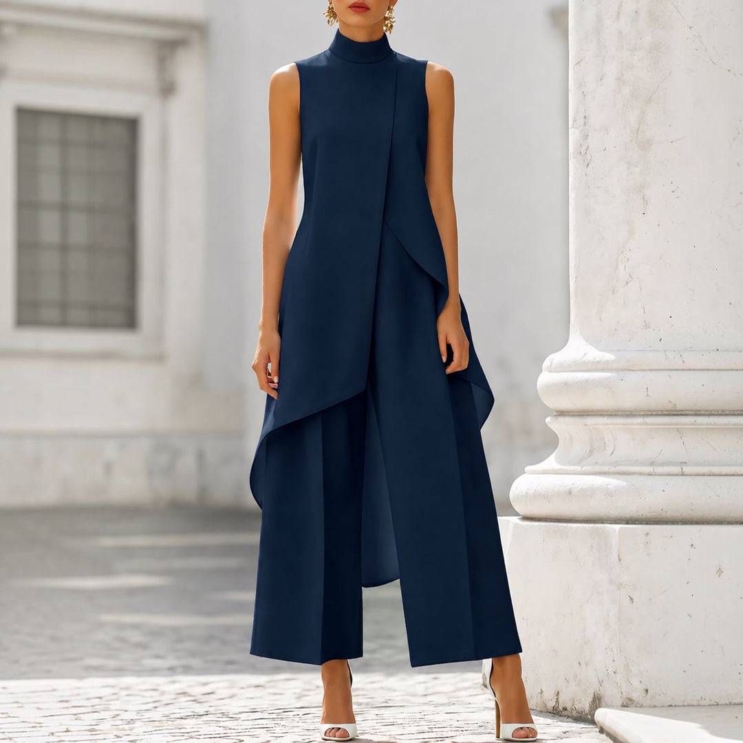 Navy sleeveless jumpsuit with draped front panel and wide leg pants
