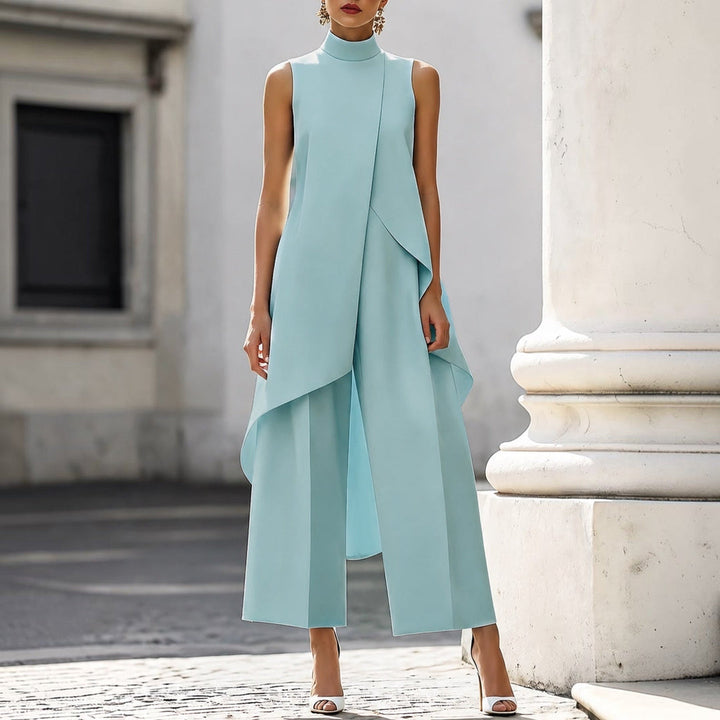 Sky blue mock neck jumpsuit with flowing drape and wide legs