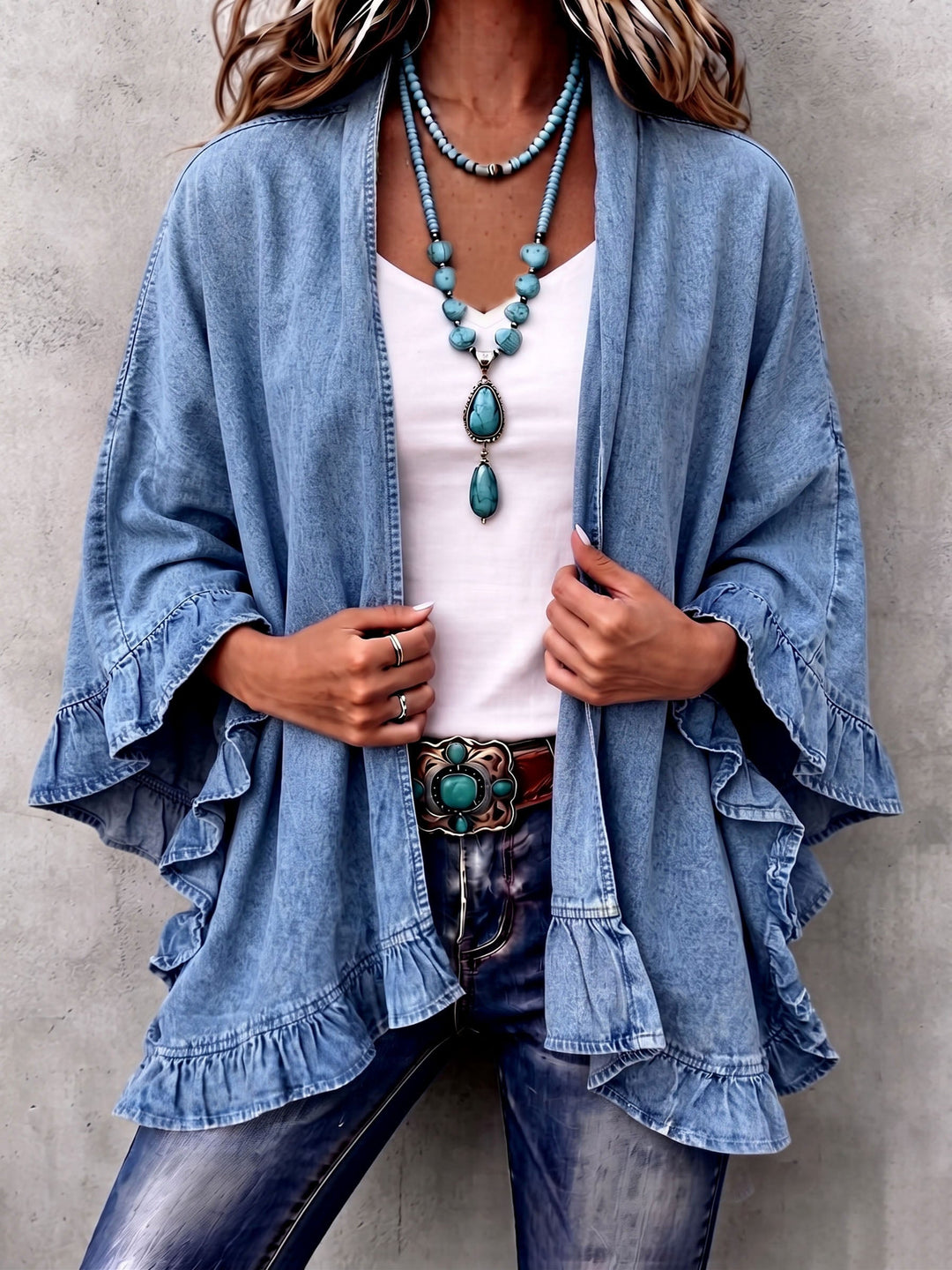 Women's kimono cardigan in denim blue with draped open front and ruffle trim