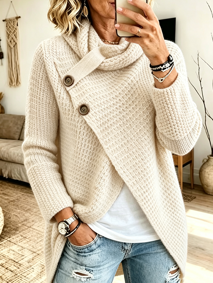 Cream cowl neck sweater with button detail at the shoulder