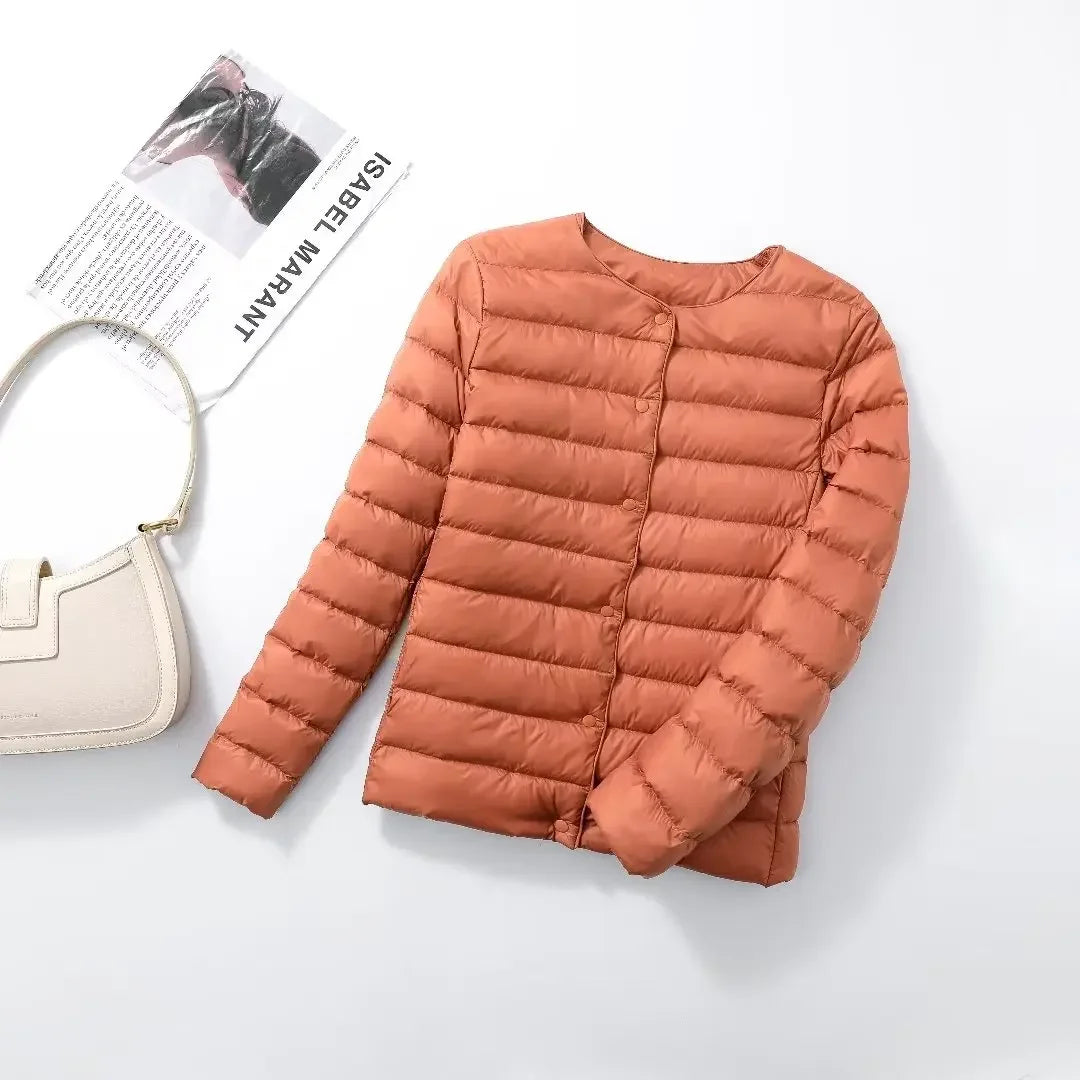 Women's coral lightweight quilted puffer jacket, front view