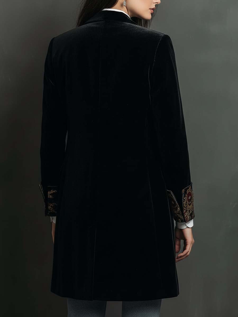 Back view of the black velvet-look long blazer
