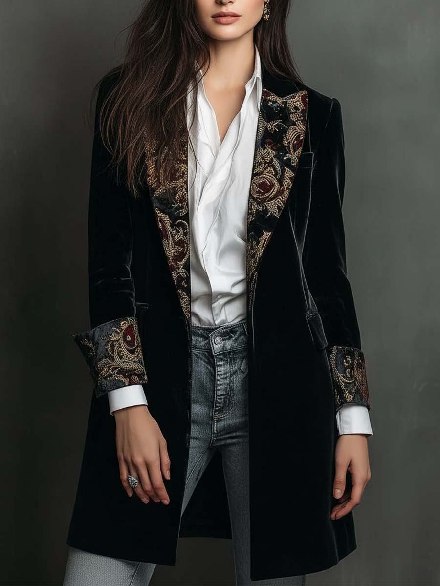 Black velvet-look long blazer front view worn open over a white shirt and jeans