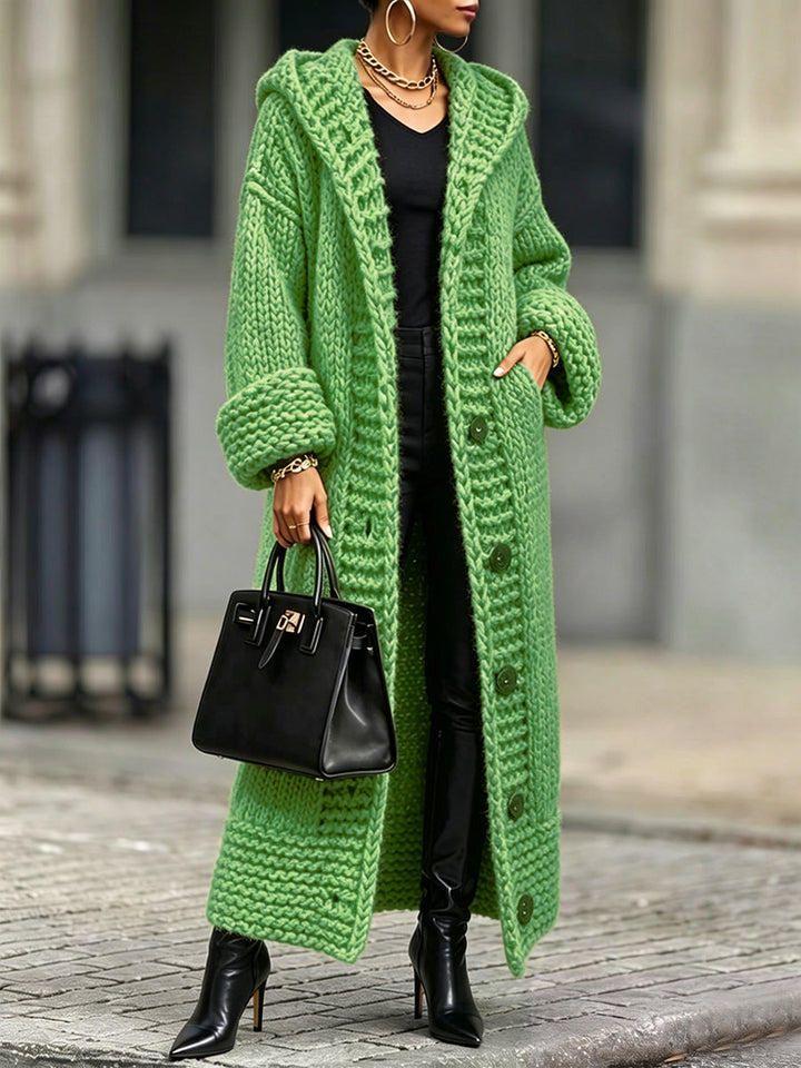 Bright green oversized cardigan with hood and full-length buttons