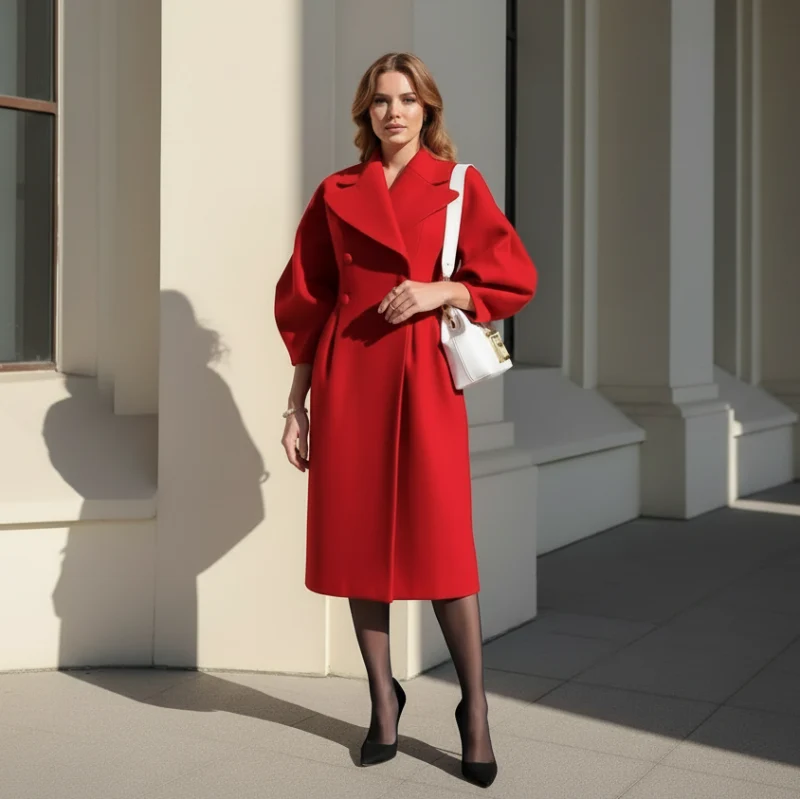 Red double breasted coat with shaped waist worn with black heels