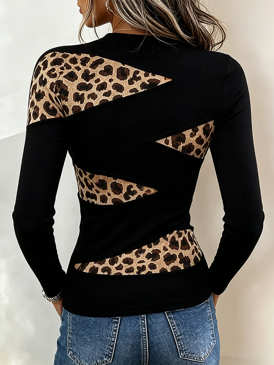 Back of the black fitted shirt with diagonal leopard inserts