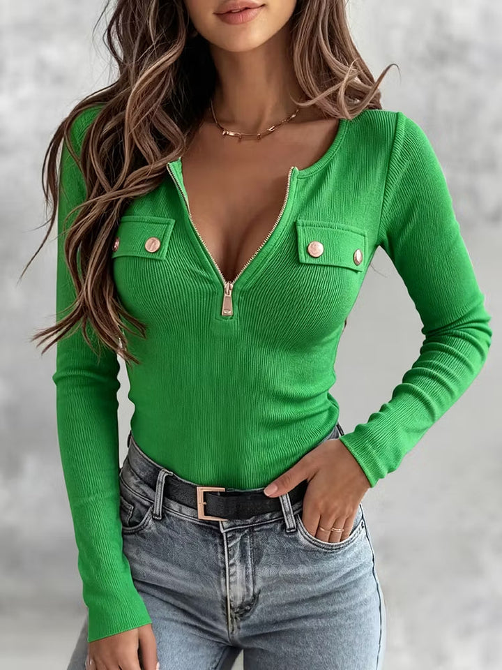 Green ribbed long sleeve top with flap pockets, front view