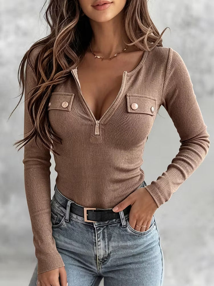 Mocha rib knit top with short front zip, worn with a belted high-rise waist