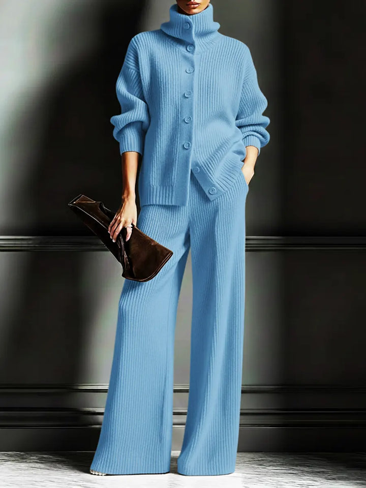 Light blue two-piece knit set worn with a brown clutch