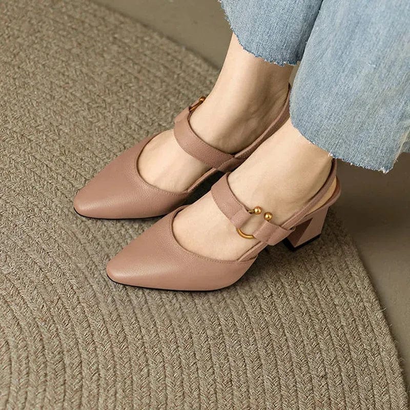 Nude Mary Jane block heels with buckle strap worn with jeans