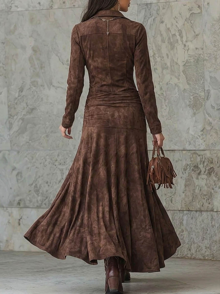 Back view of the chocolate suede-look dress with a full flared skirt