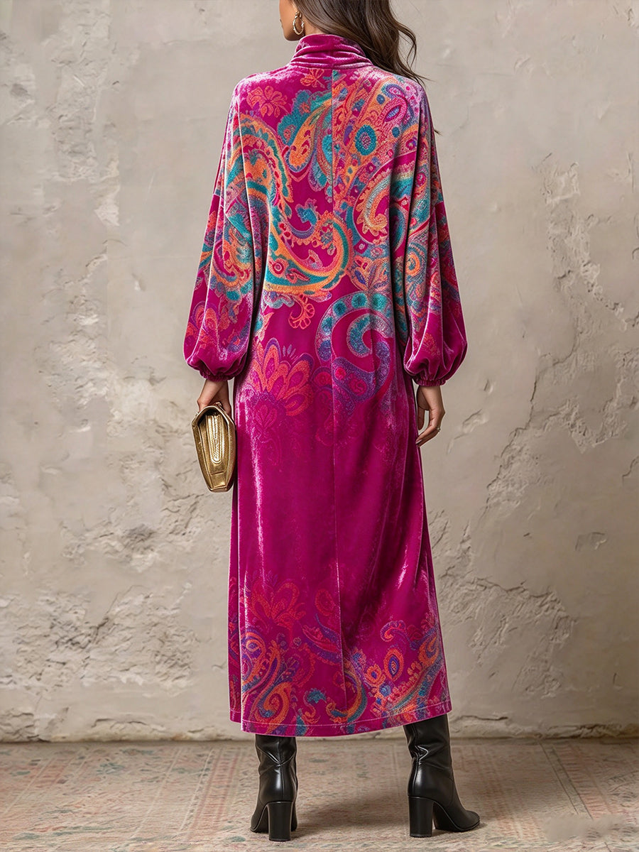 Back view of the paisley maxi dress with full gathered sleeves