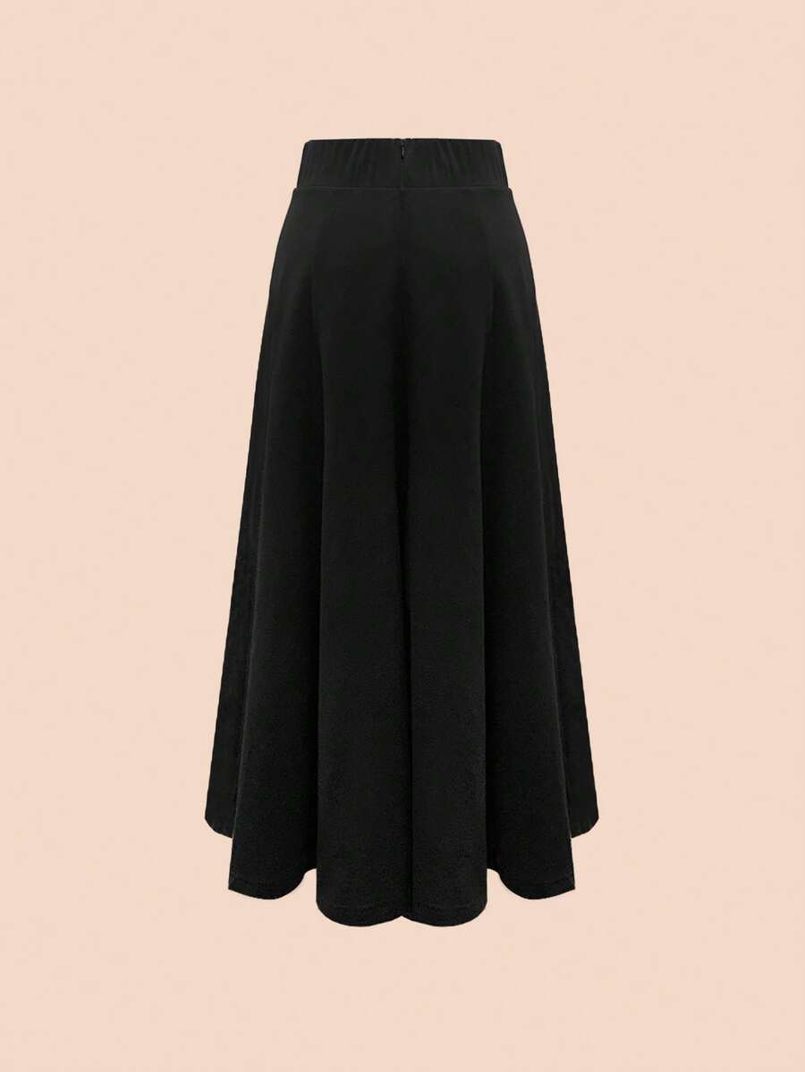 Back view of the black maxi skirt with its flared A-line shape