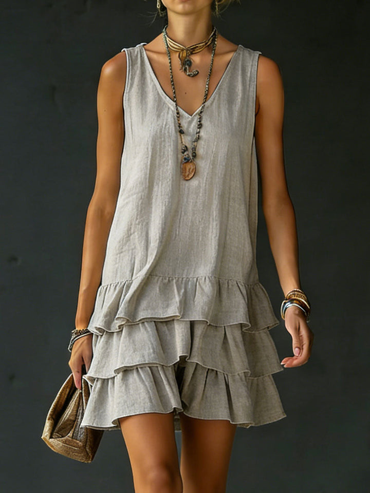 Gray V neck mini dress with a relaxed drop waist