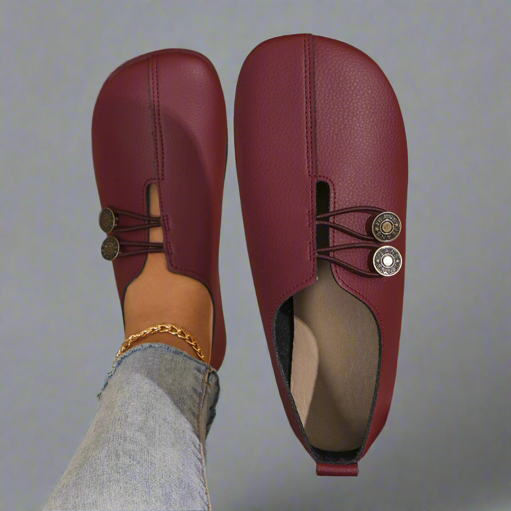 Burgundy soft moccasins seen from above