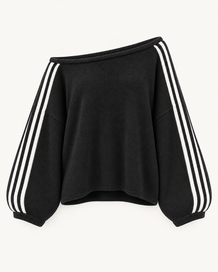 Black oversized sweater with white striped balloon sleeves, flat view