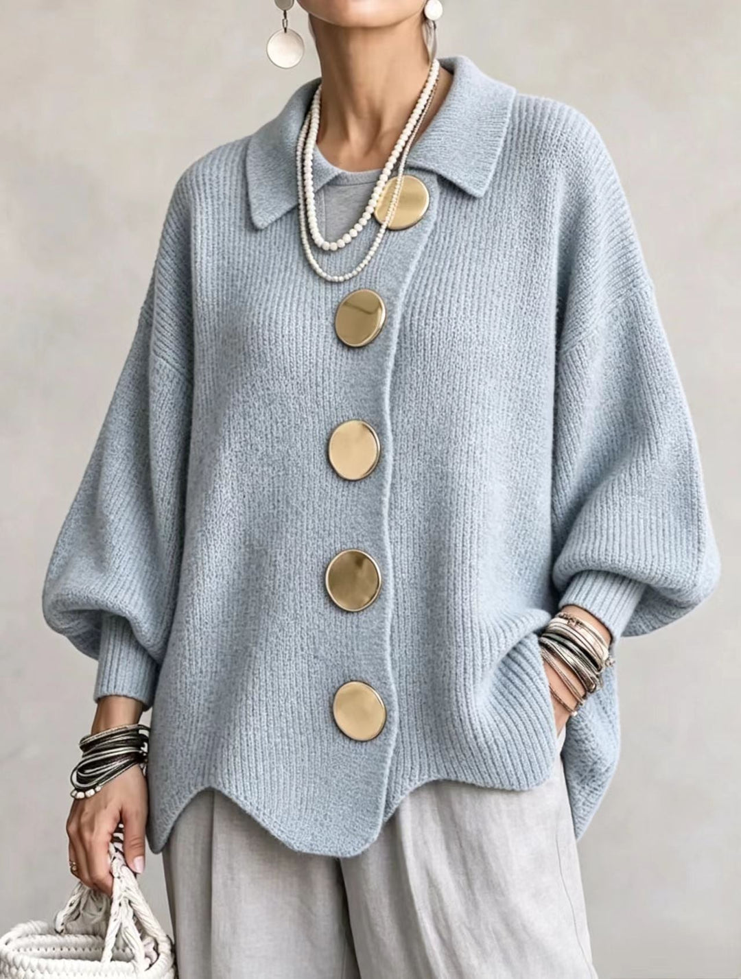 Sky blue cardigan with collar and gold-tone buttons, front view