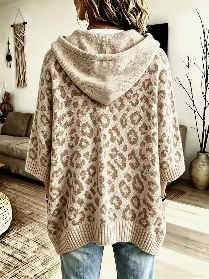 Back view of the beige sweater with wide three-quarter sleeves