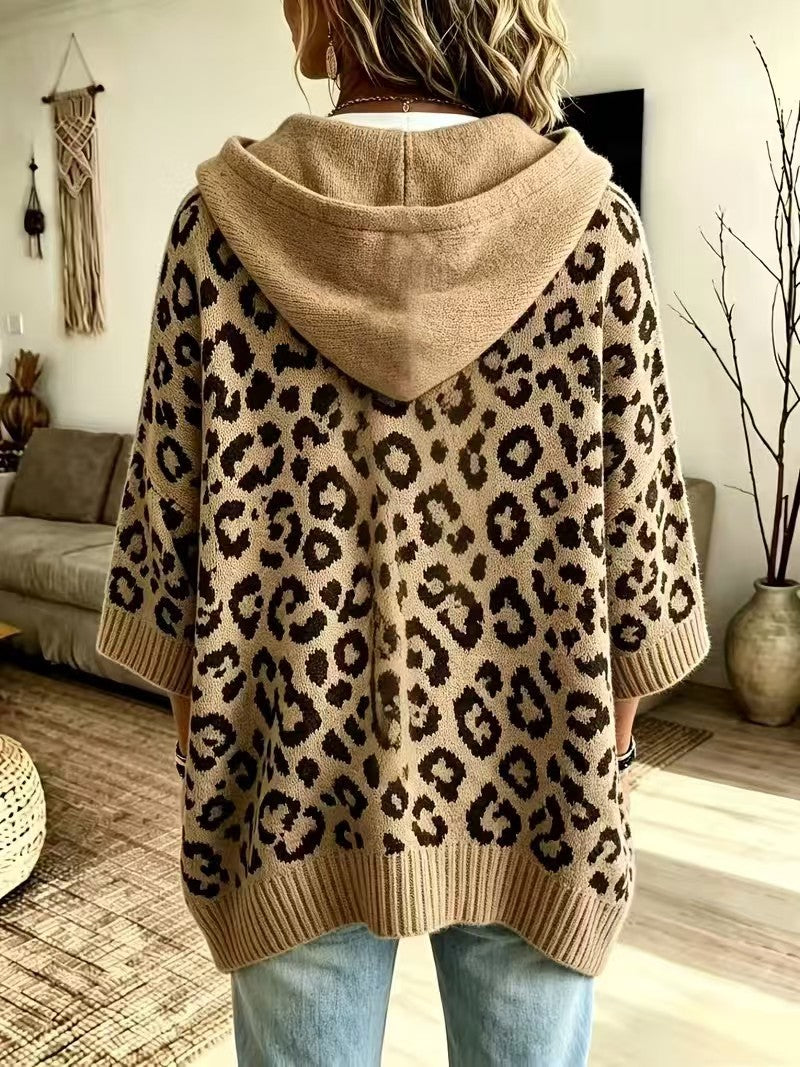 Back of the camel leopard sweater showing the plain hood and ribbed hem