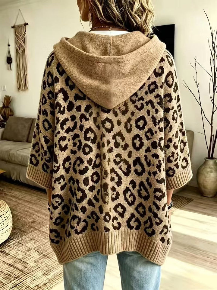 Back of the camel leopard sweater showing the plain hood and ribbed hem