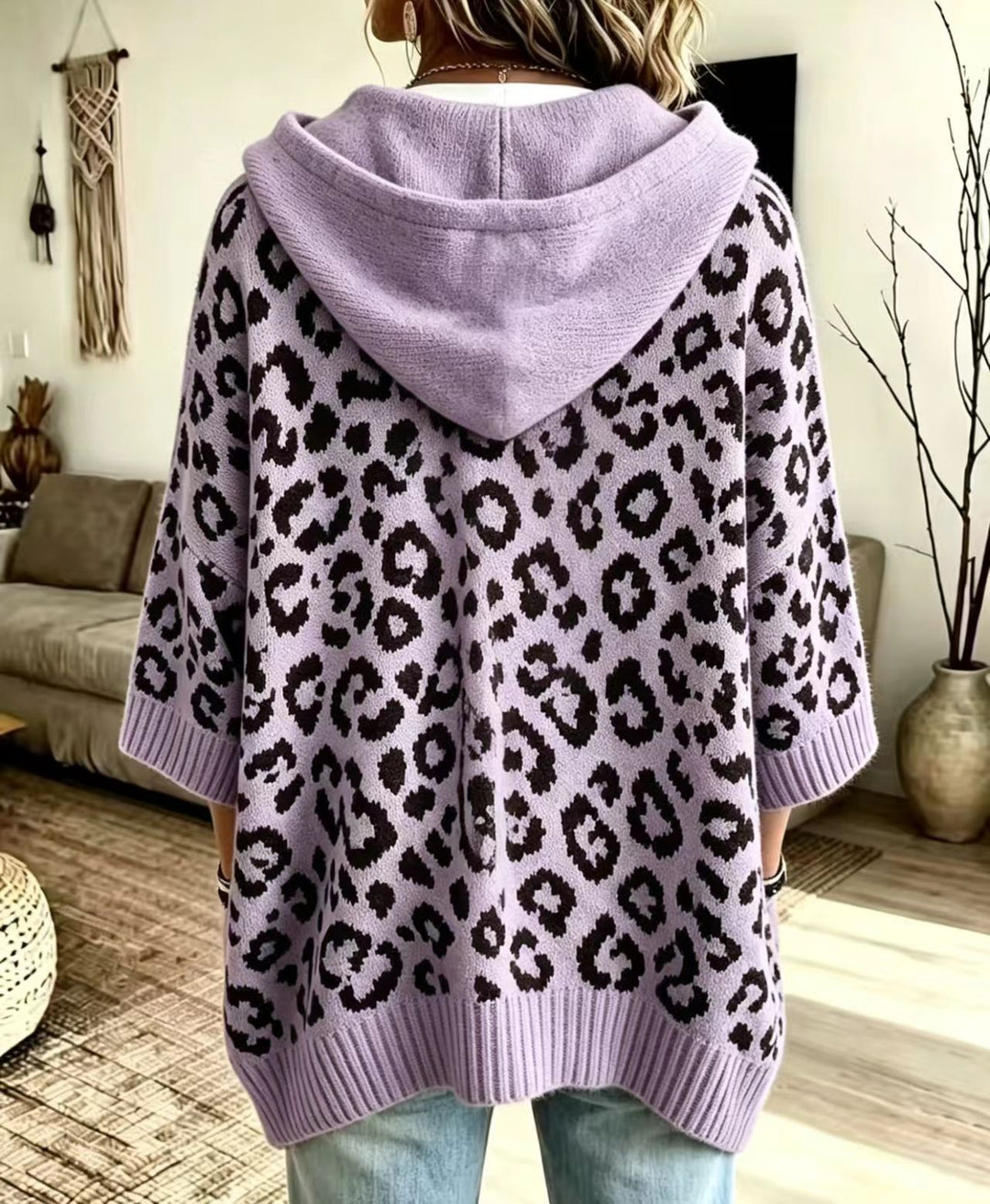 Back of the lavender knit sweater with ribbed cuffs and hem