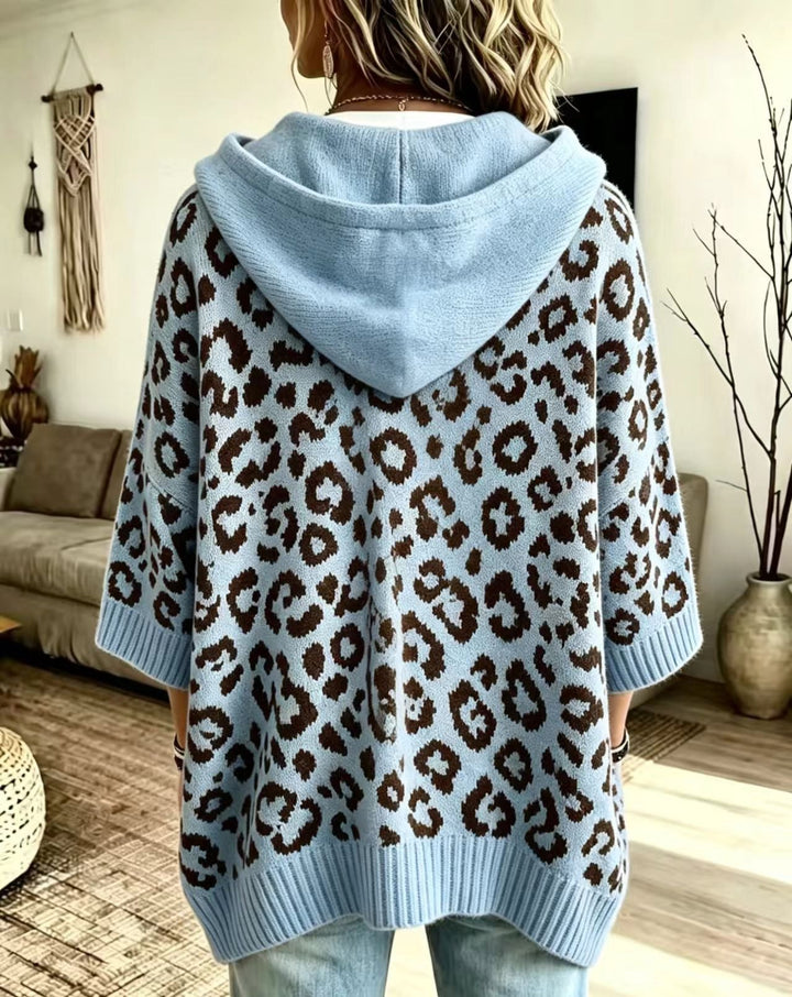 Sky blue leopard sweater from the back with a relaxed batwing shape