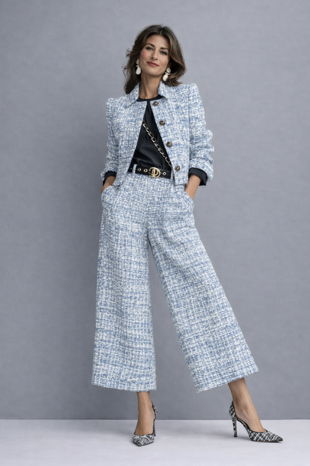 Light blue pantsuit with cropped jacket and wide leg pants, standing pose