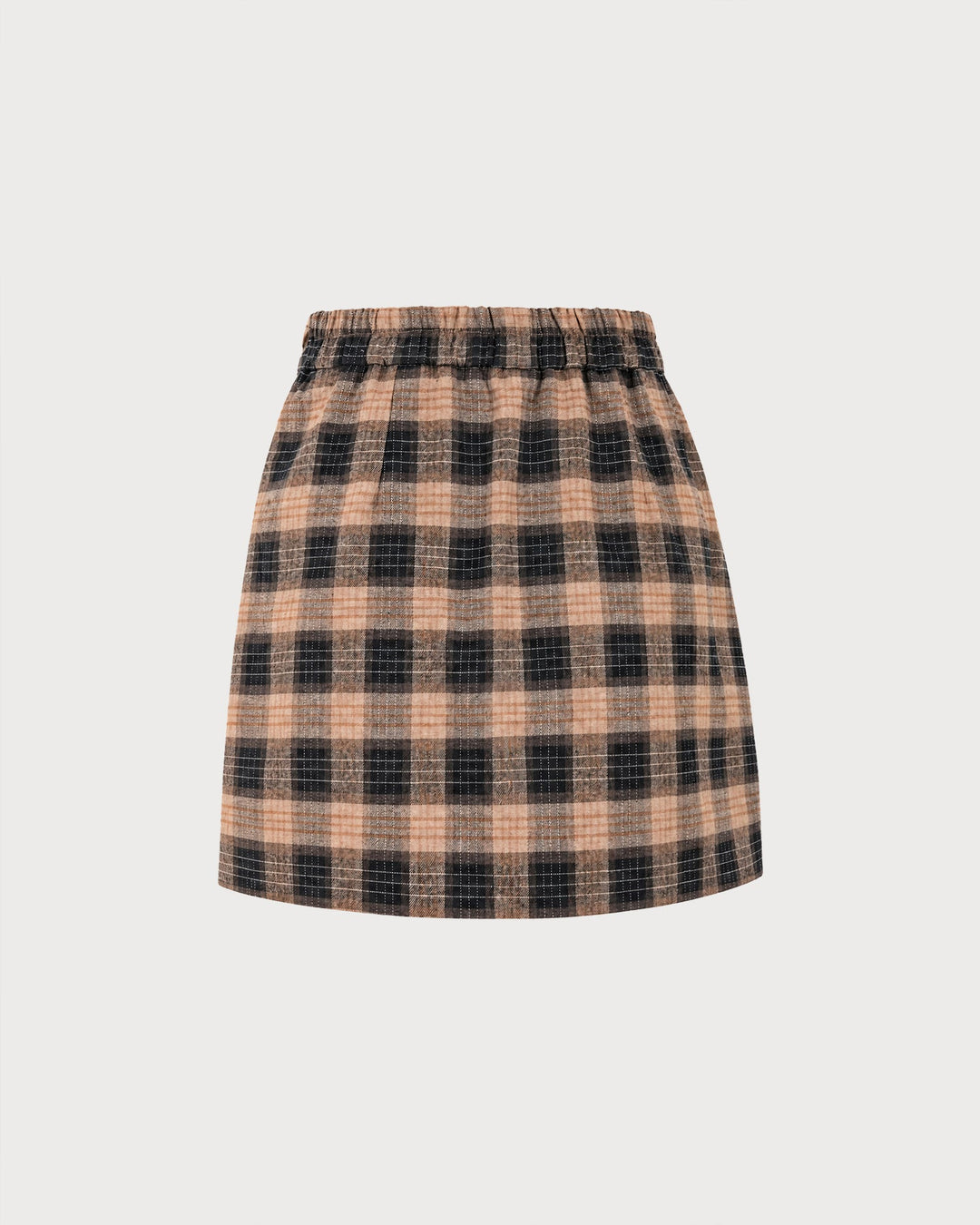 Second flat view of the brown plaid mini skirt showing the elastic waistband