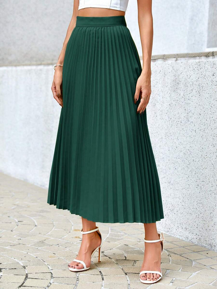 Front view of the flowy green pleated midi skirt with a high elastic waist