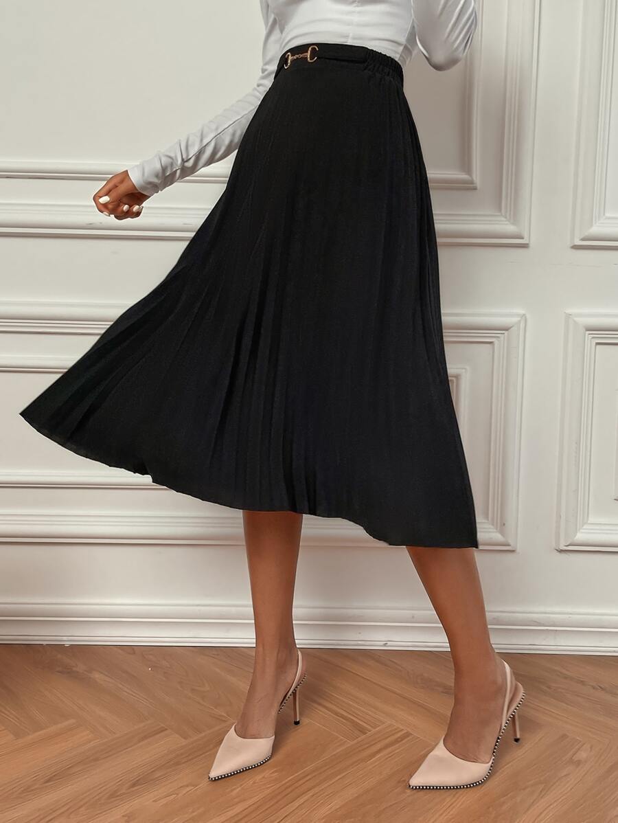 Black flared midi skirt swinging with movement, side view