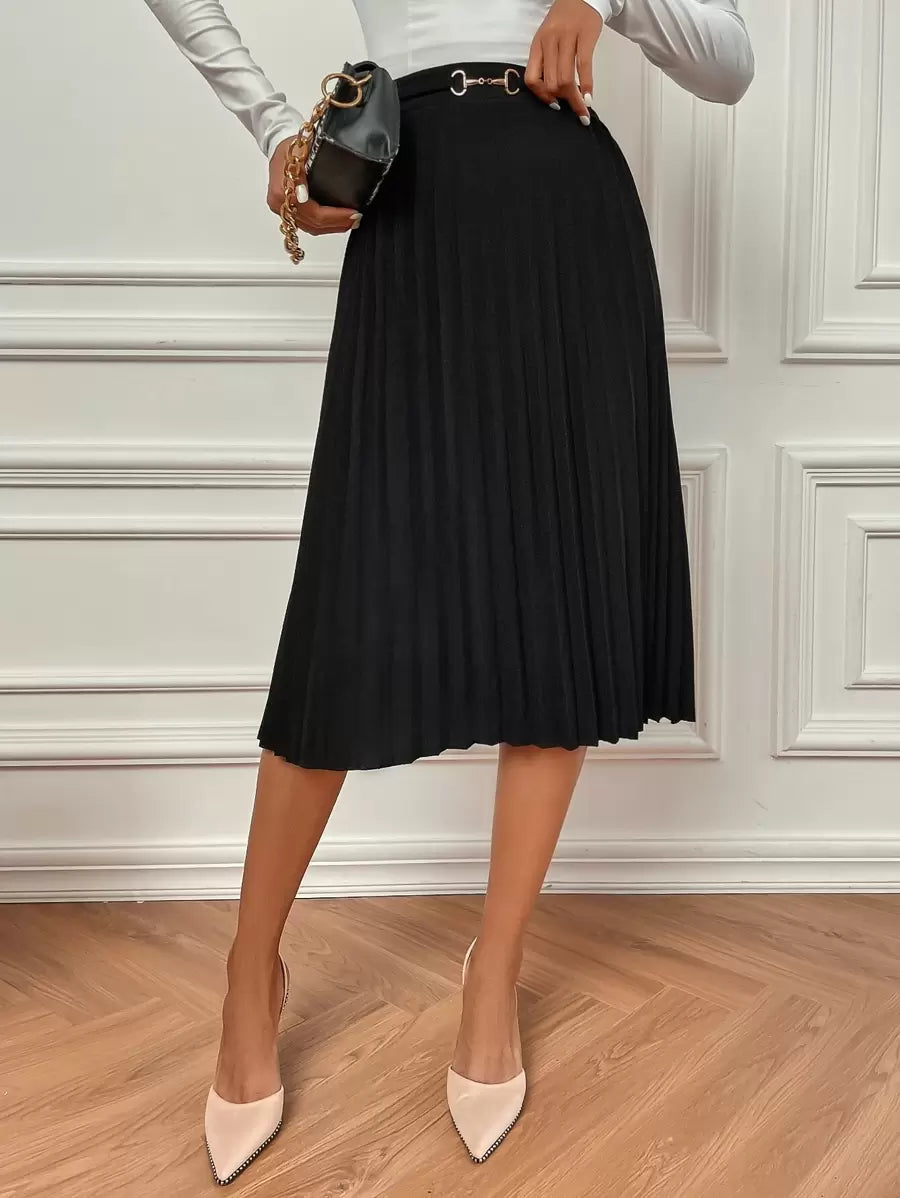 Black flared pleated skirt with gold buckle belt, front view with heels