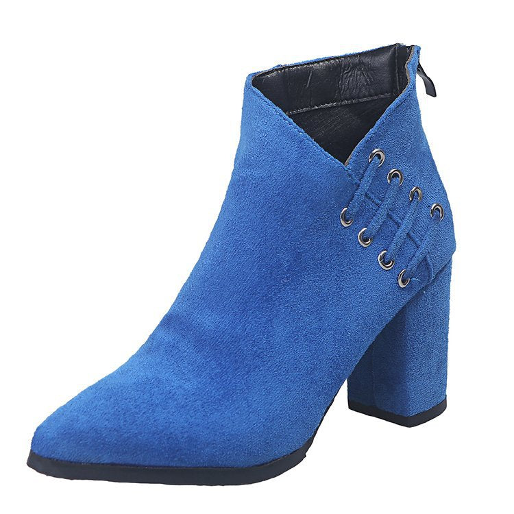 Royal blue pointed toe bootie on a white background showing the block heel