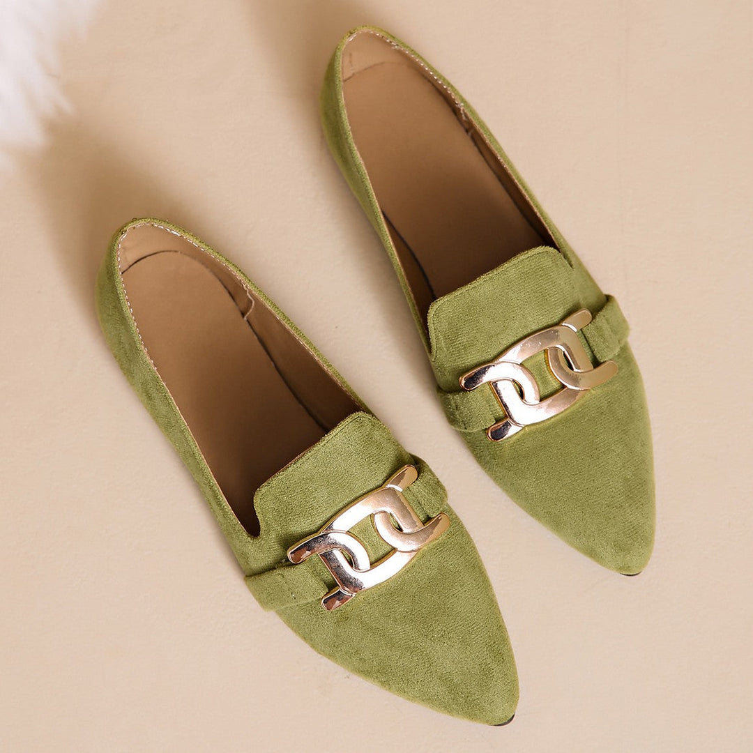 Pair of olive loafers with chain detail seen from above