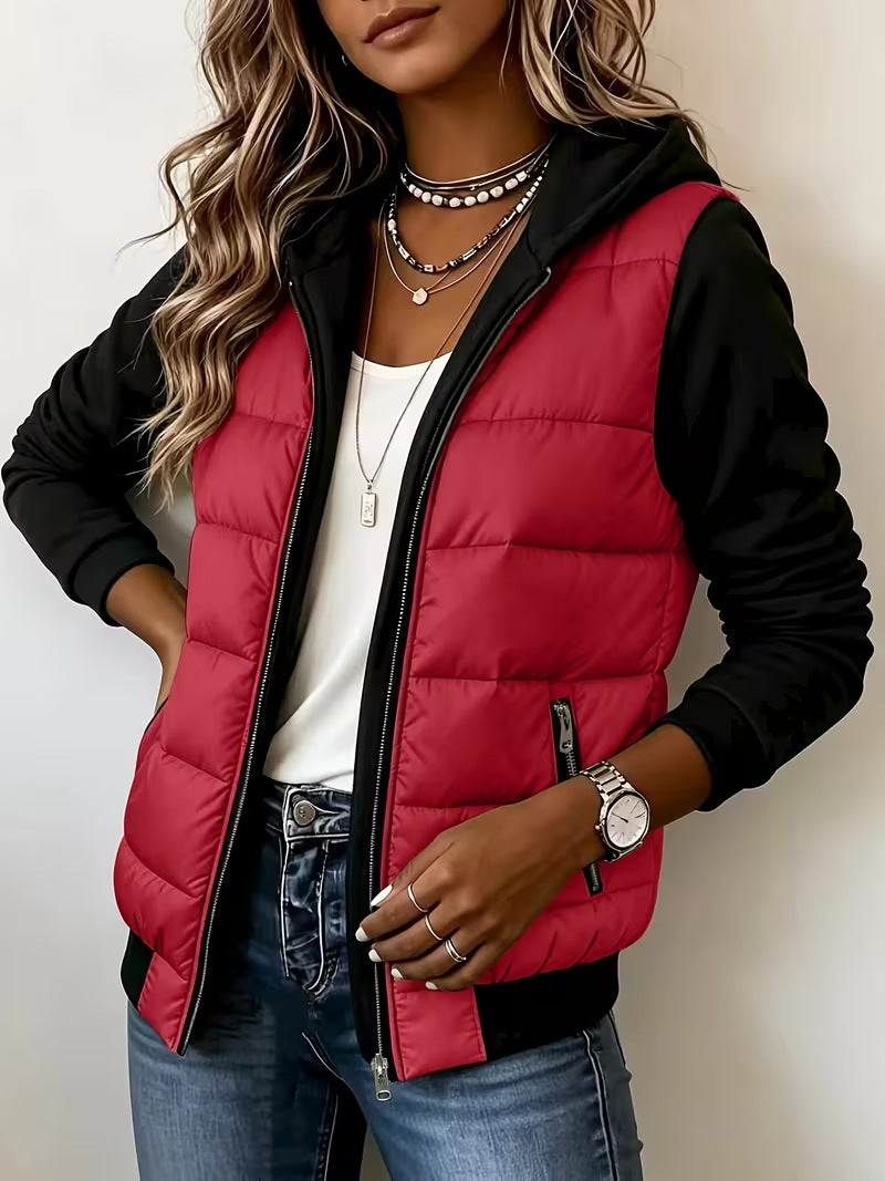 Red puffer jacket with black knit sleeves and hood, front view