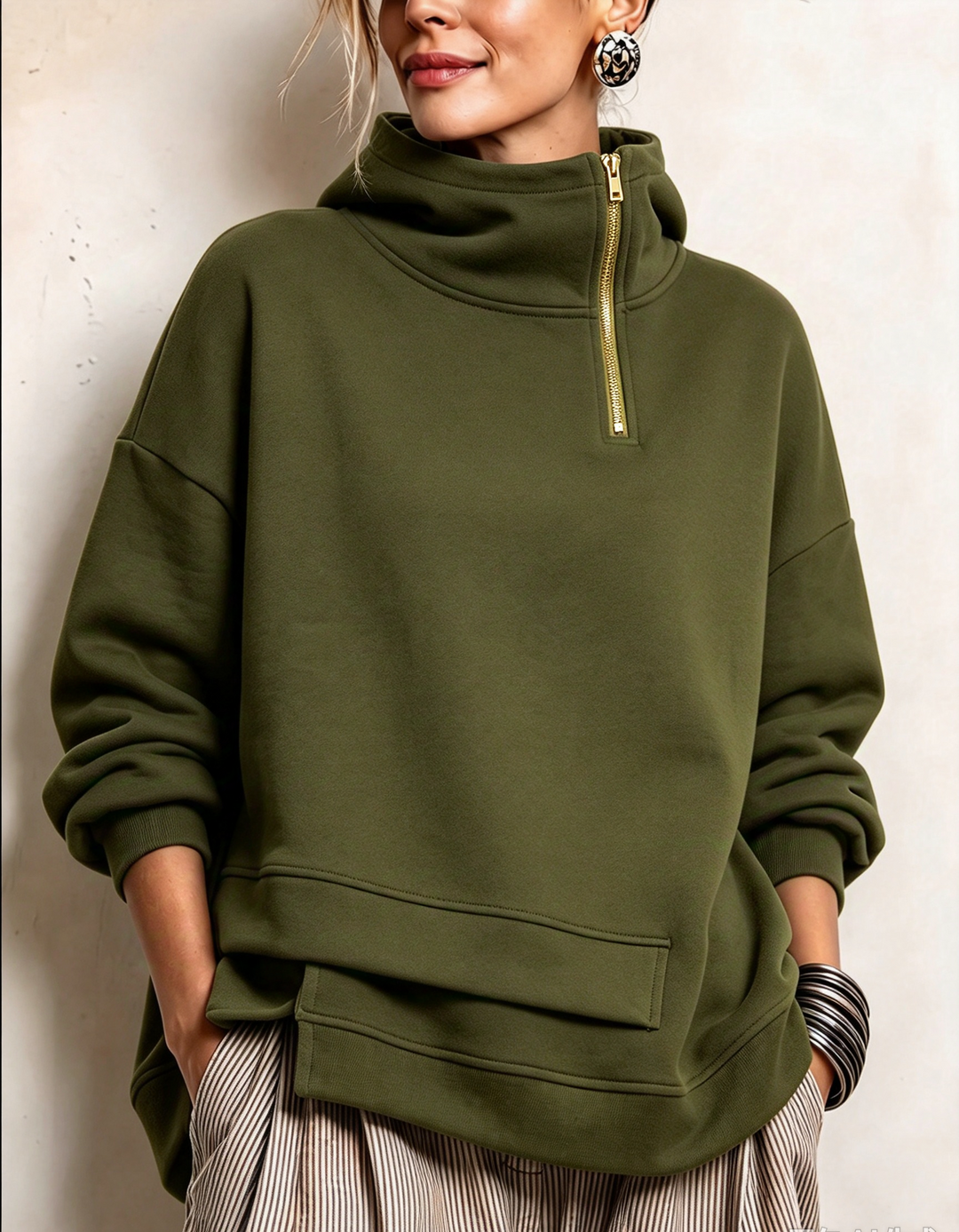 Olive quarter zip sweatshirt with layered hem