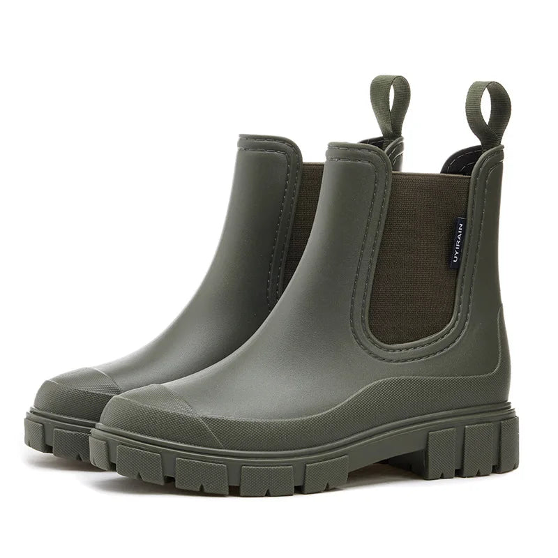 Olive green Chelsea ankle rain boots with chunky tread sole
