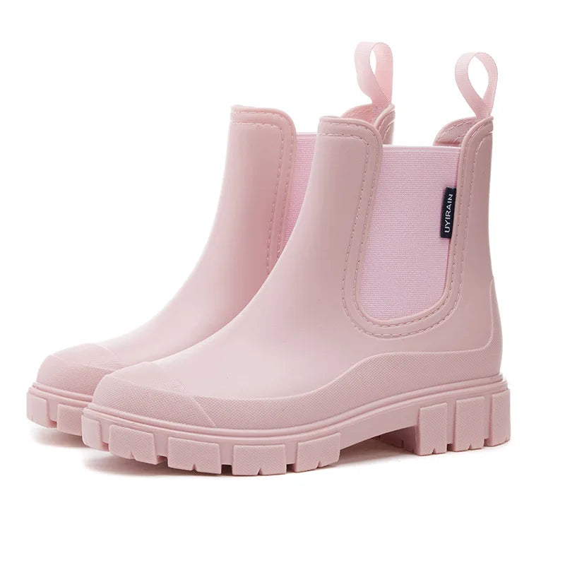 Women's rain boots in pink, Chelsea ankle style with chunky lug sole