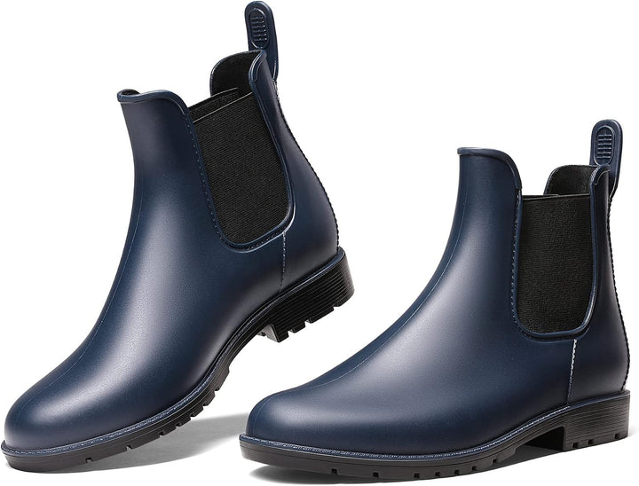 Pair of navy Chelsea ankle rain boots with elastic side panels