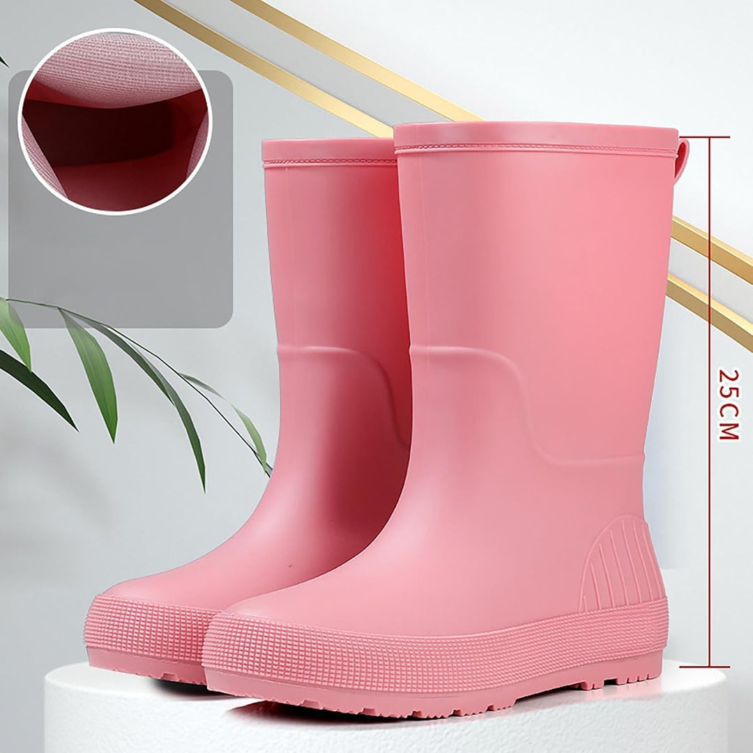 Pink mid calf rain boots on a display stand with a height measurement