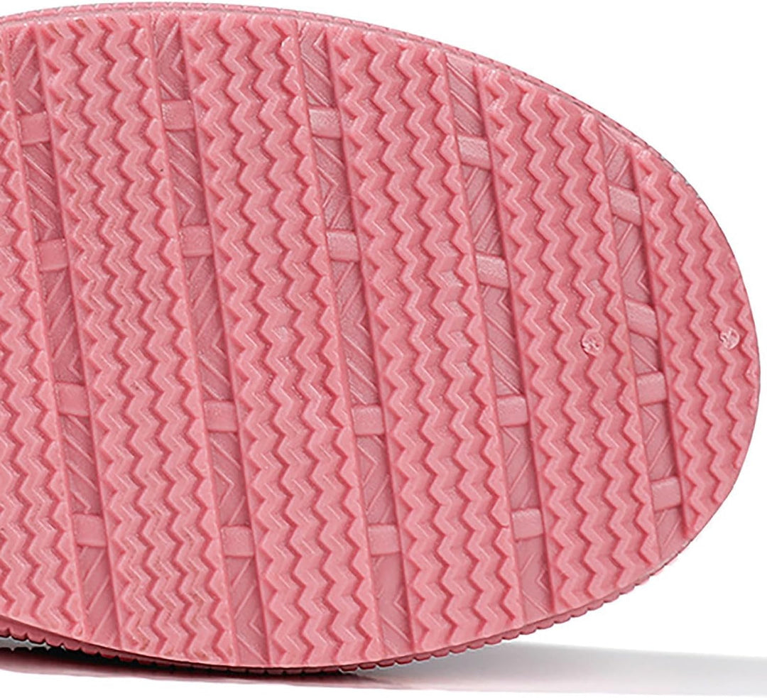 Pink rain boot outsole with zigzag tread pattern