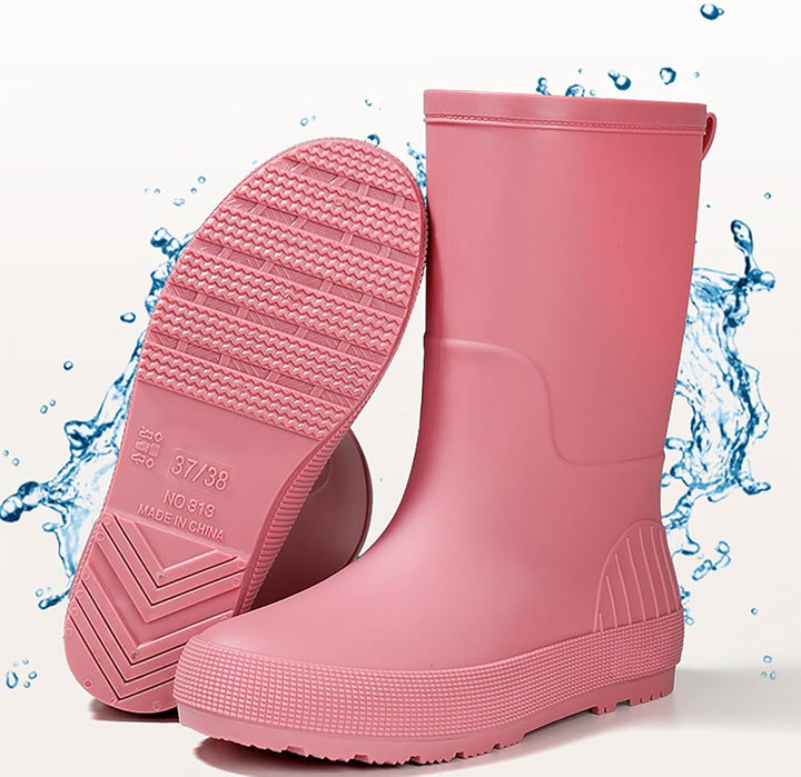 Pink mid calf rain boots with splashing water, one showing the tread
