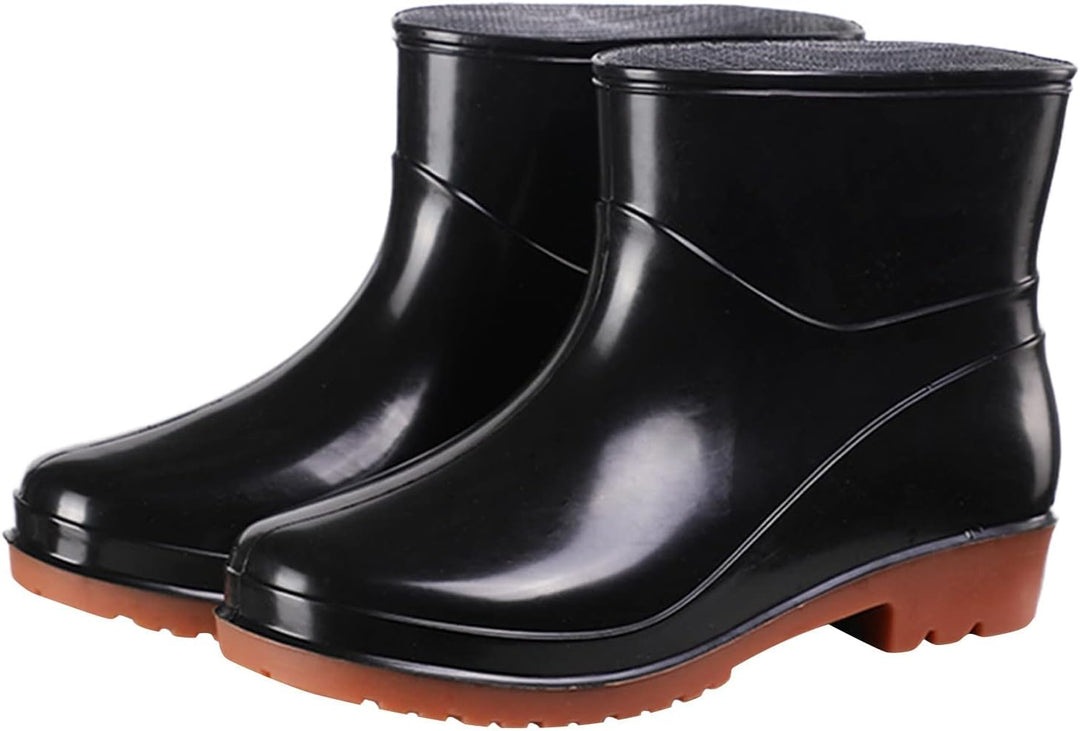 Black short rain boots with a brown sole and low block heel
